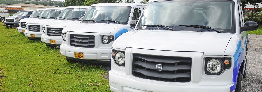 Five new GRTA vehicles in a parking lot Five new GRTA vehicles in a parking lot